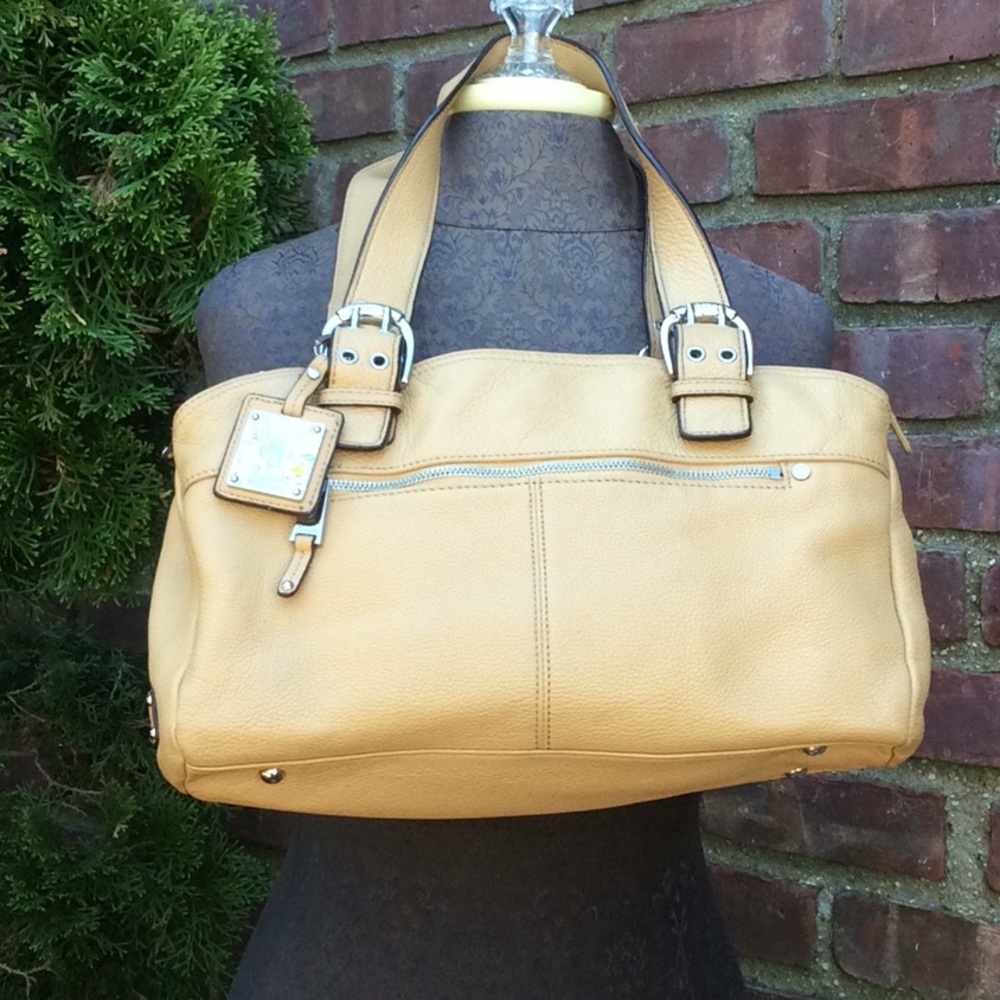 TIGNANELLO BUTTER TAN HAND BAG-gently used

Reasonable offers accepted.